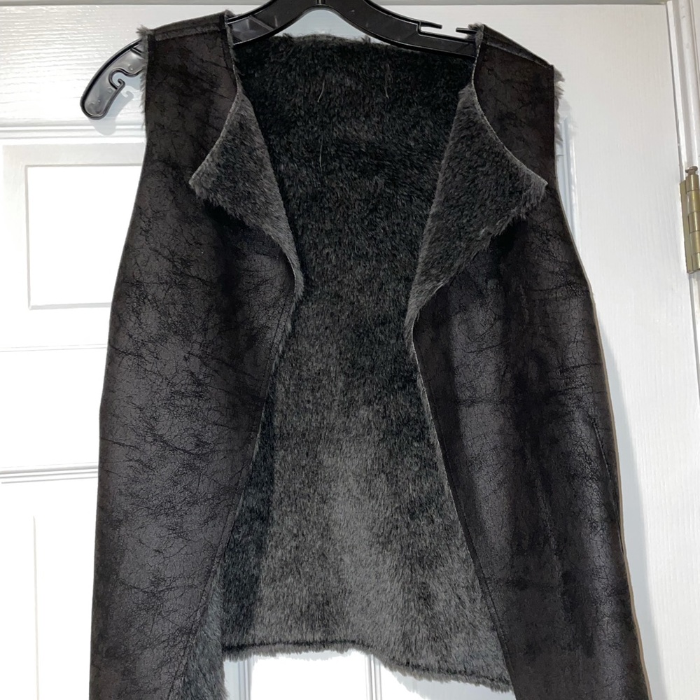 Small black vest